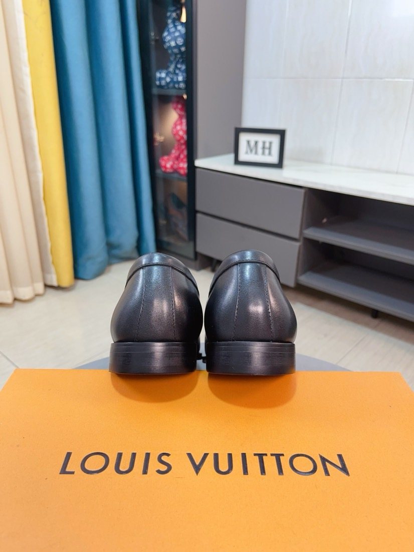 Louis Vuitton Leather Loafers — back