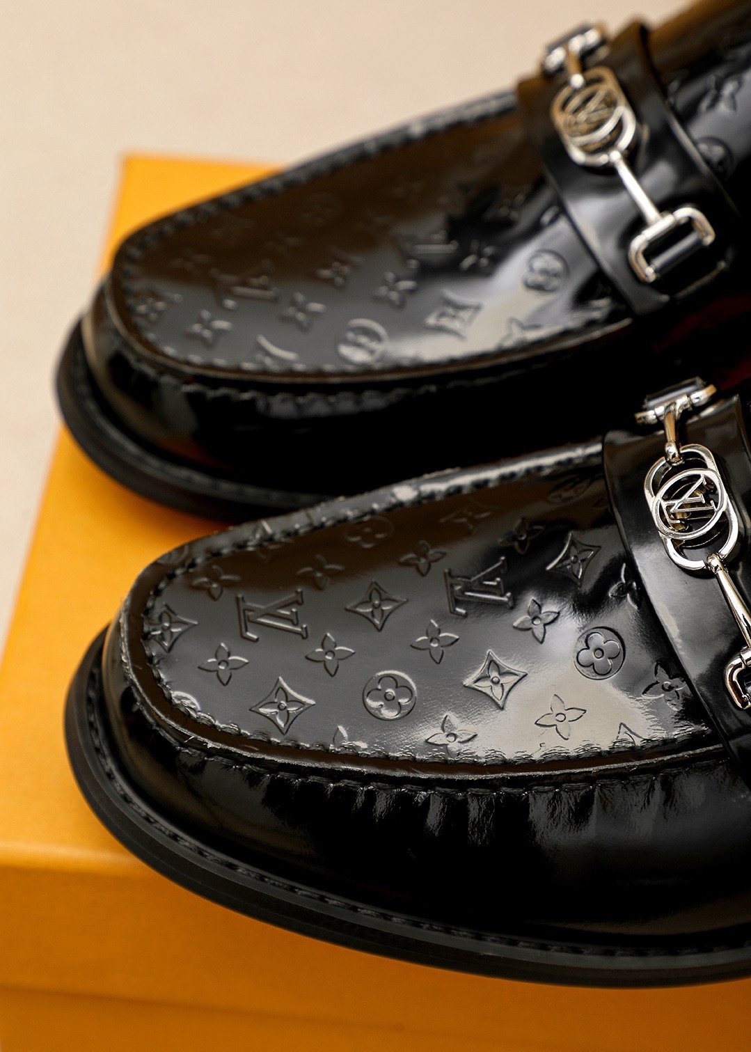 Louis Vuitton Embossed Buckle Loafers — detail