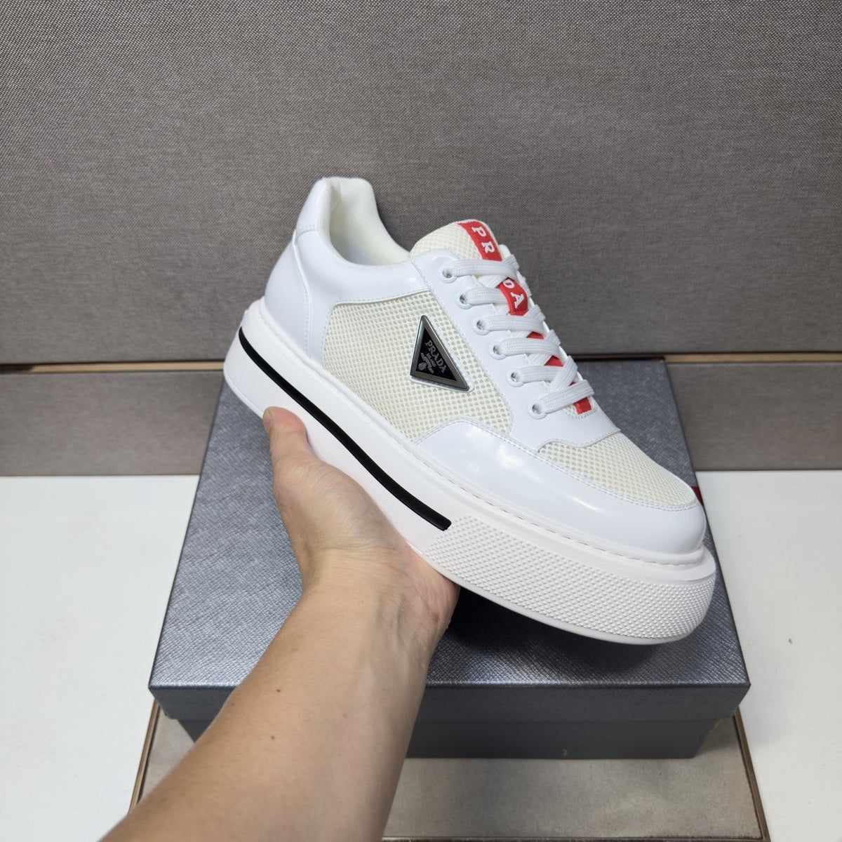 Prada Contrast Panel Low-Top Sneakers — model