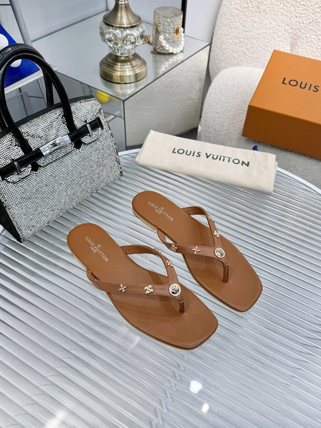 Louis Vuitton Metal-Detail Thong Sandals — front