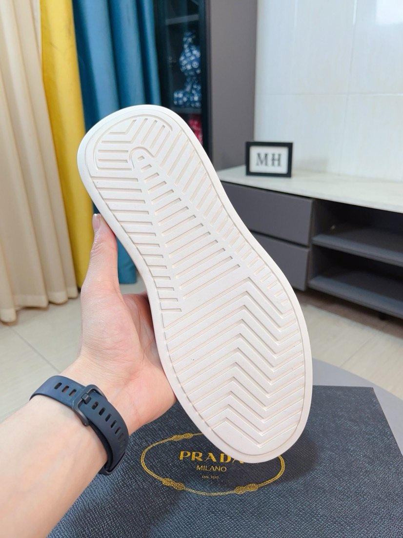 Prada Textured Slip-On Shoes — side